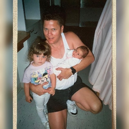 Childhood photo of Bridgette Bjorolo with her father and sister. Who are Bridgette's parents and siblings!